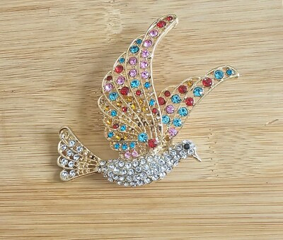 #ad LARGE FLYING BIRD BROOCH WITH MULTICOLORD RHINESTONES. $10.00