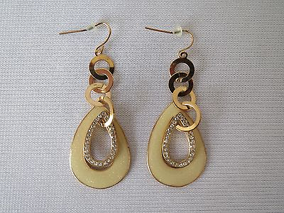 #ad Fashion Earrings Drop Style With Four Golden Hoops And Two Open Teardrops. $7.49