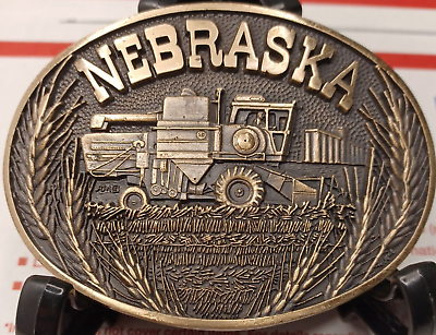 #ad Nebraska Brass Belt Buckle Harvester Farmer Tractor Made in U.S.A. 1980#x27;s NOS $35.99