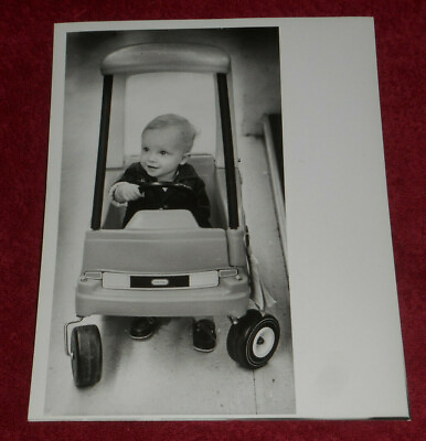 #ad 1983 Press Photo Toddler Tries Out Toy Car Christmas Shopping Toys R Us Dedham $7.73
