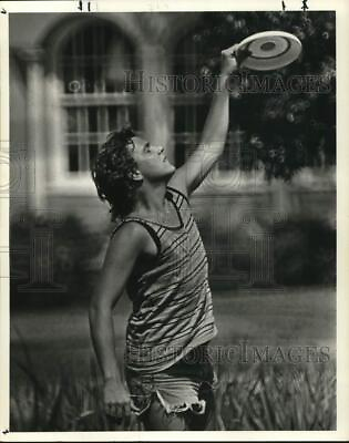 #ad 1974 Press Photo Frisbee tosser catches projectile in mid air in Bell Park. $12.99