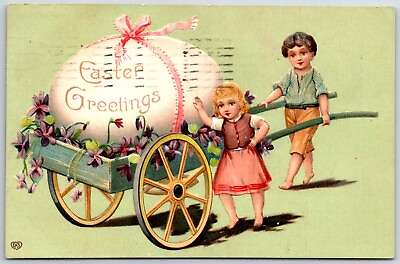#ad 1909 Easter children egg ribbon wheelbarrow flowers embossed postcard $11.24