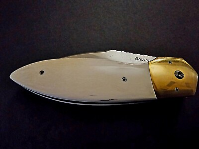 #ad Sterling Custom Knives Frame Release Auto 154 CPM BladesteelBrass Ivory $1400.00