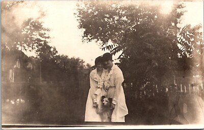 #ad VINTAGE RPPC POSTCARD TWO YOUNG LADIES IN VINTAGE DRESS WITH DOG BETWEEN THEM $8.99
