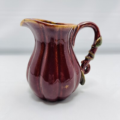#ad Red Ceramic Pitcher with Vines on Handle 5 1 4” $11.98