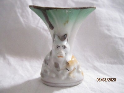 Miniature antique Vase with Dog on front $10.00