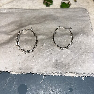 #ad Silver Tone Hoop Earrings Wrapped Around Statement Hoops $2.00