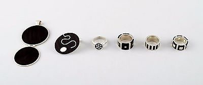 #ad Collection of jewelry in sterling silver most with mountings of ebony $420.00