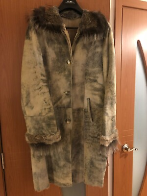 #ad Sheepskin coat with fur collar $210.00