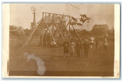 #ad 1913 School Playground Swings Children Spearville Kansas KS RPPC Photo Postcard $39.95