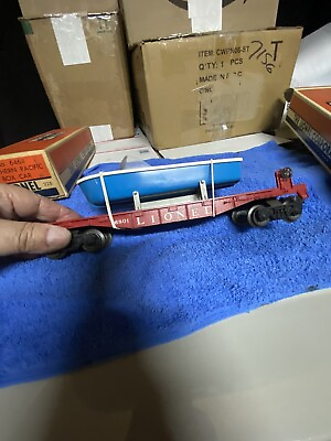 #ad Lionel 6891 25flatcar W boat Blue Hull in near mint condition with box $85.00
