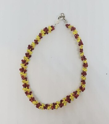 #ad yellow and red beaded bracelet $13.00